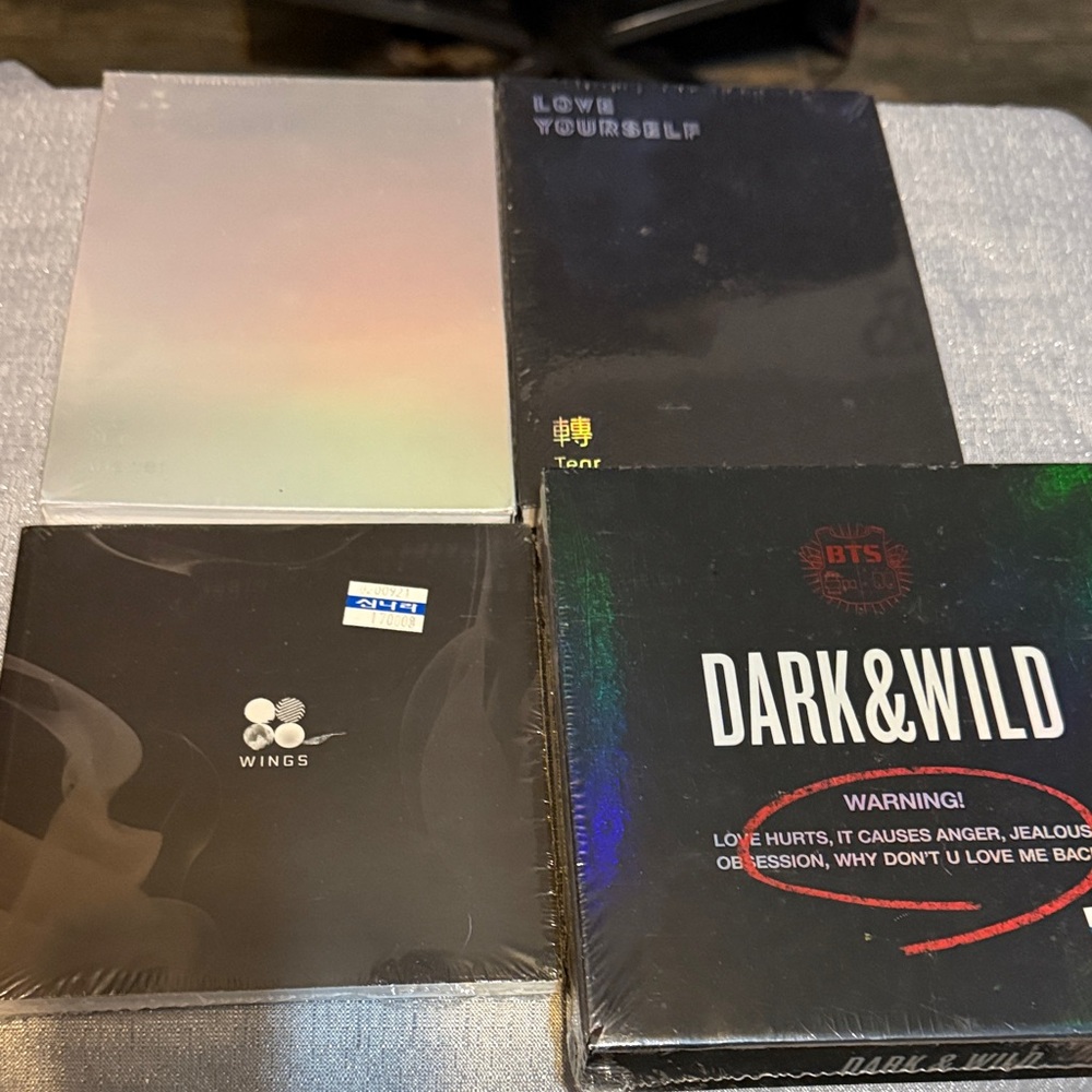 Dark & Wild Album with Holographic Design